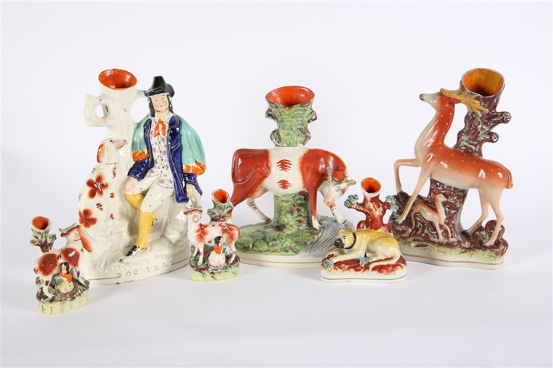 Six Staffordshire Spill Vases: Ceramic. "Dog Tray": Height: 12 3/4", Length: 8 1/2", Depth: 3". Deer: Height: 12 1/4", Length: 7 1/2", Depth: 2 1/2". Cow: Height: 11", Length: 8 1/4", Depth: 4". Dog: Height: 5 3/4", Length: 5 1/4",