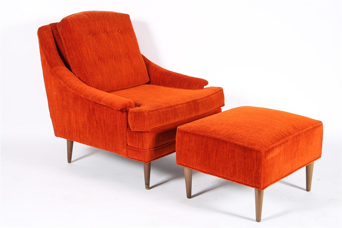 Style of Dunbar, Lounge Chair and Ottoman: Walnut, upholstery. Chair: Height: 31 3/4", Length: 30", Depth: 31 1/2". Ottoman: Height: 14 1/2", Length: 22 1/2", Depth: 19 1/2". Upholstered mid-century lounge chair on four tapered walnut legs. Bu