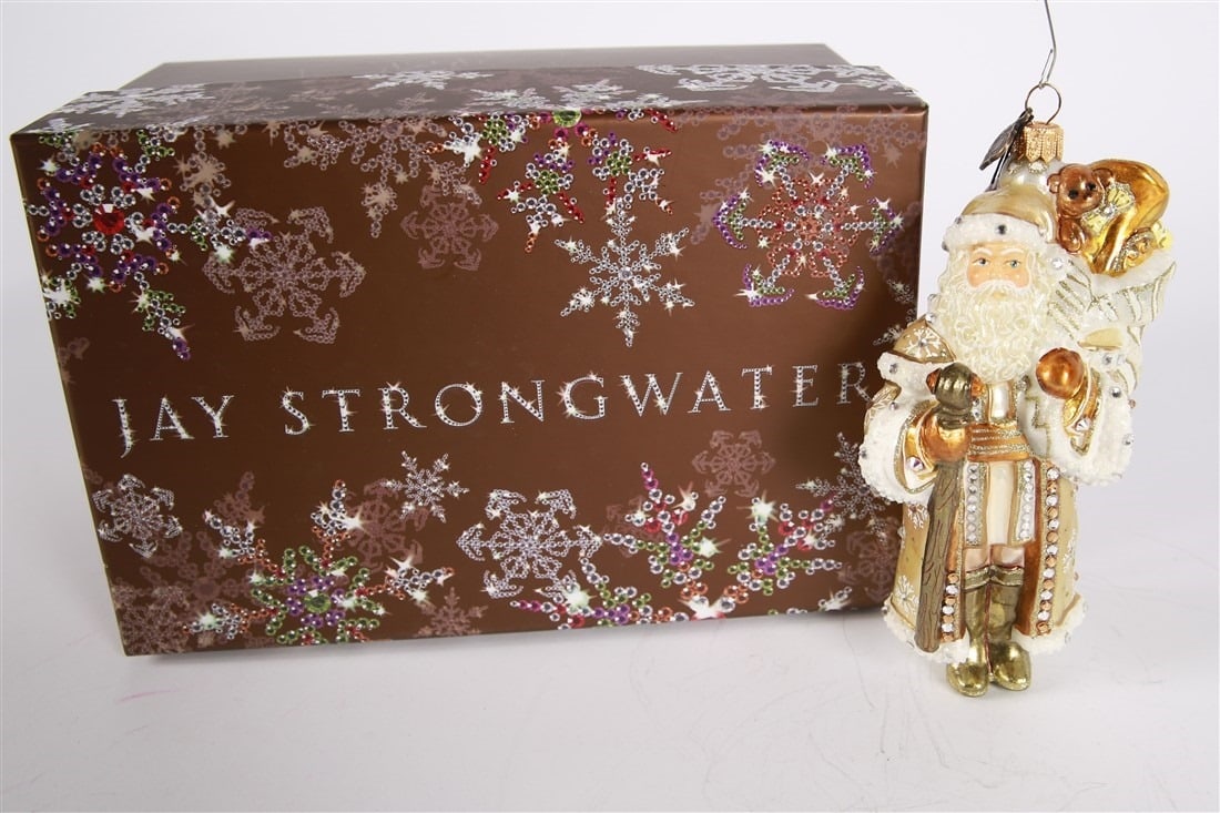 Jay Strongwater, Golden St. Nicholas Ornament: Jay Strongwater (American, established 1995). Glass. Height: 6 1/2", Length: 3 1/4", Depth: 3". Glass standing St. Nicholas ornament in "golden" color. Includes box and overwrap.