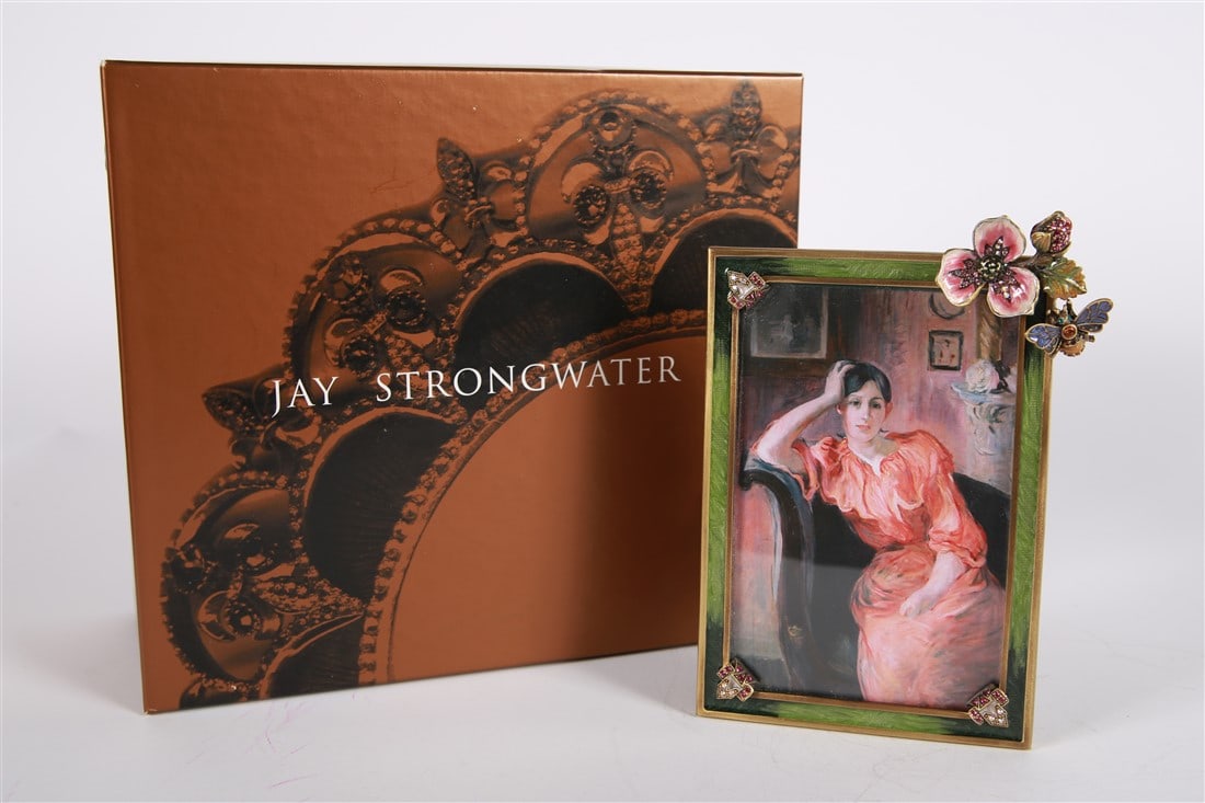 Jay Strongwater, 4x6 Rose Celadon Dogwood Frame: Jay Strongwater (American, established 1995) Enamel, metal. Collection: Flora and Fauna. Frame: 7 1/2" x 4 5/8". Sight: 5 1/2" x 3 3/4". Enamel and rhinestone frame with dogwood flower and bee element