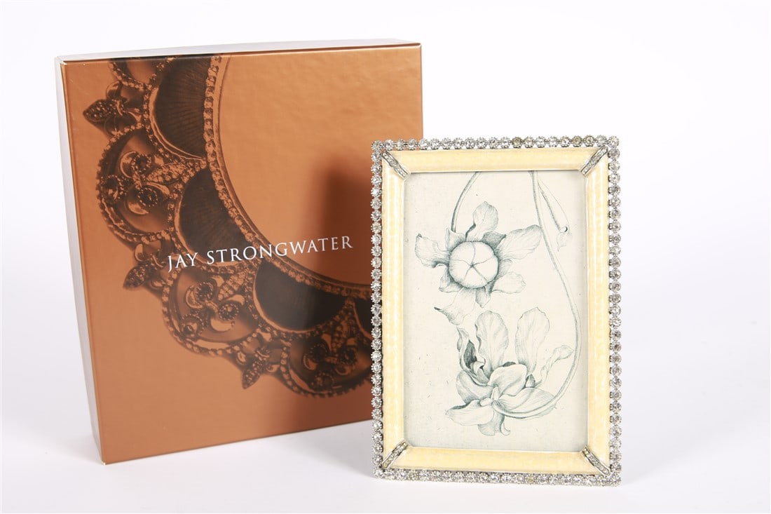 Jay Strongwater, 4x6 Golden Pearl Stone Edge Frame: Jay Strongwater (American, established 1995). Enamel, metal. Frame: 7 1/4" x 5 1/4". Sight: 5 3/4" x 3 3/4". Warm metallic beige colored enamel with rhinestone decorated edge and corners. Includes scr