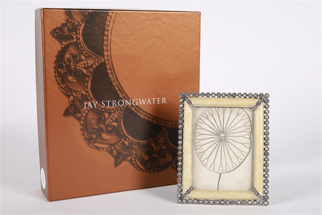 Jay Strongwater, 3x4 Pearl Stone Edge Frame: Jay Strongwater (American, established 1995). Enamel, metal. Frame: 5 1/8" x 4 1/4". Sight: 3 3/4" x 3". Silver tone metal and white/cream toned enamel surrounded by white rhinestone edge, additional 