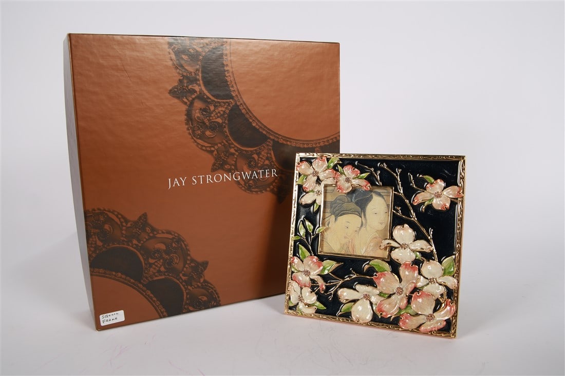 Jay Strongwater, 3x3 Black Dogwood Frame: Jay Strongwater (American, established 1995). Enamel, metal. Frame: 7 1/2" x 7 1/4". Sight: 3" x 3". Gilt enamel frame with black ground and floral dogwood motif with rhinestones at center of flowers.