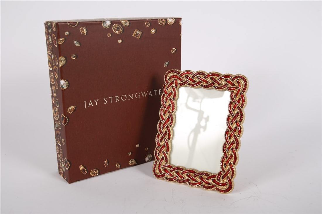 Jay Strongwater, 3.5x5 Bouquet Braided Frame: Jay Strongwater (American, established 1995). Enamel, metal. Frame: 6 3/8" x 5". Sight: 4 1/2" x 3". Braided design frame with "bouquet" colored red enamel and rhinestone elements. Includes box, overw
