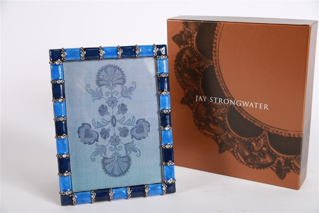 Jay Strongwater, 5x7 Delft Garden Striped Frame: Jay Strongwater (American, established 1995). Enamel, metal. Collection: Indigo. Frame: 7 3/4" x 6". Sight: 6 1/2" x 4 3/4". Striped enamel and metal frame with alternating shades of blue and blue and