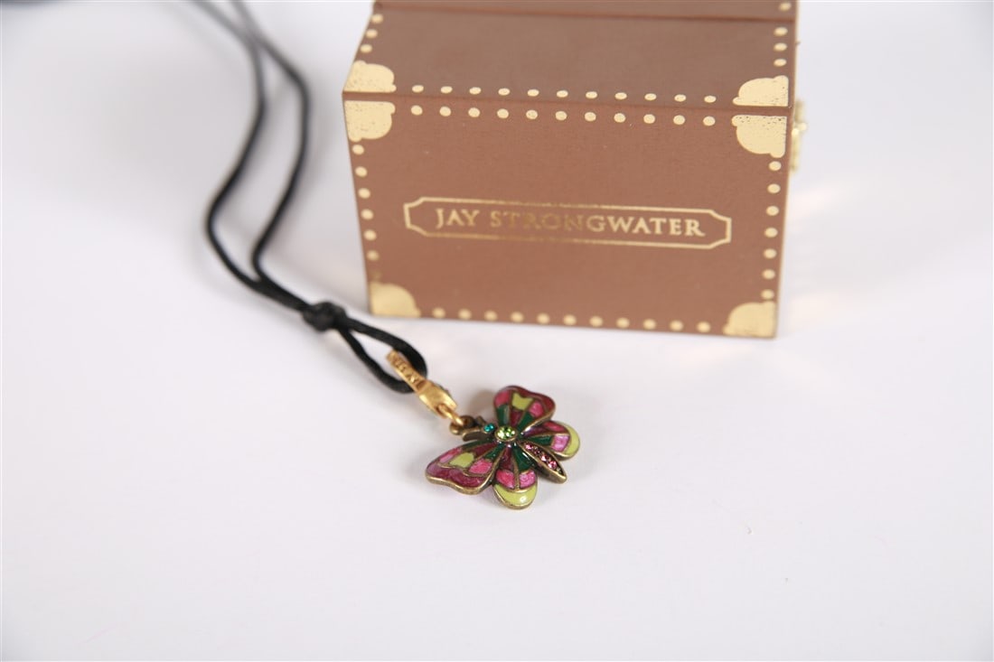 Jay Strongwater, "Donna" Butterfly Necklace: Jay Strongwater (American, established 1995). "Donna" butterfly necklace. Enamel, metal. Produced for Neiman Marcus. Cord length: 20". Pendant: 1 3/4" x 1". Green and purple enamel with green, blue, a