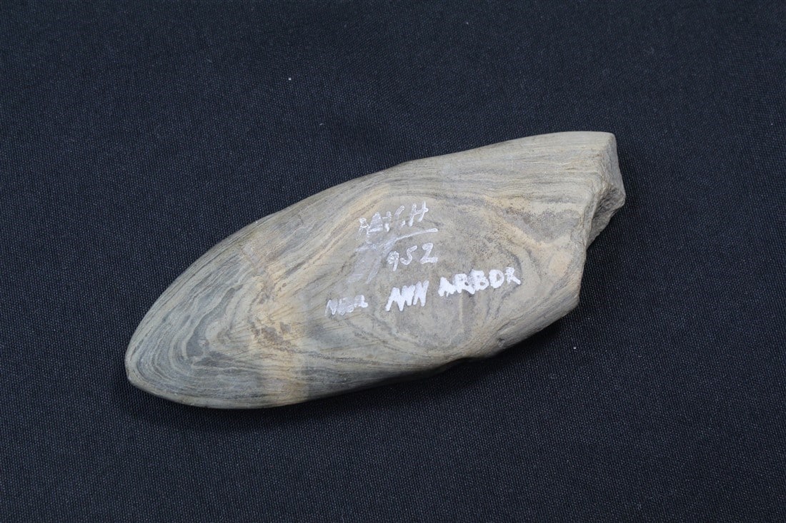 Damaged Banner Stone: 5 3/4" X 2 1/4". Near Ann Arbor, Michigan.