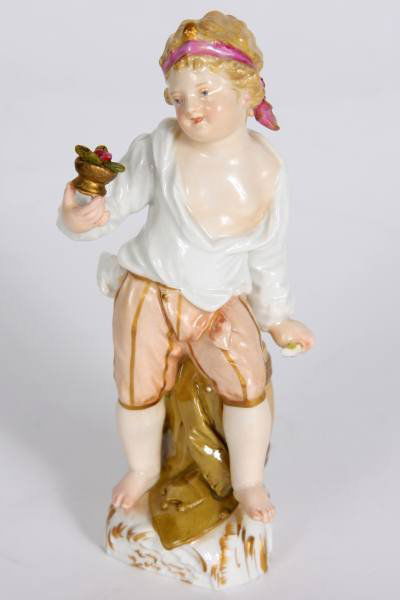 KPM Porcelain of a Boy with Flower, German: KPM porcelain of a boy with a flower. German, late 19th or early 20th century. Height 4 1/2".