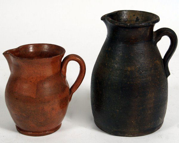Two Redware Pottery Pitchers, Late 19th C.: Two redware pottery pitcher. American, late 19th century. Height 7 1/2" and 10".