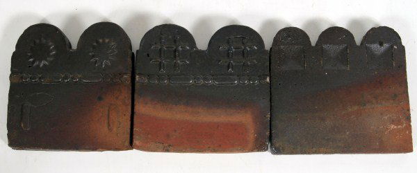 Three Redware Pottery Edging Tiles, 20th C.: Three redware pottery edging tiles. American, 20th century. Height 8", width 7 1/2".