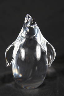 Steuben, "Penguin" Figurine: Steuben Glass Works (American, established 1903). "Penguin". Crystal. Designed by George Thompson, 1973. Design: 8295. Height: 3 3/4", Length: 2 3/8", Depth: 1 3/4". Crystal standing penguin figurine.