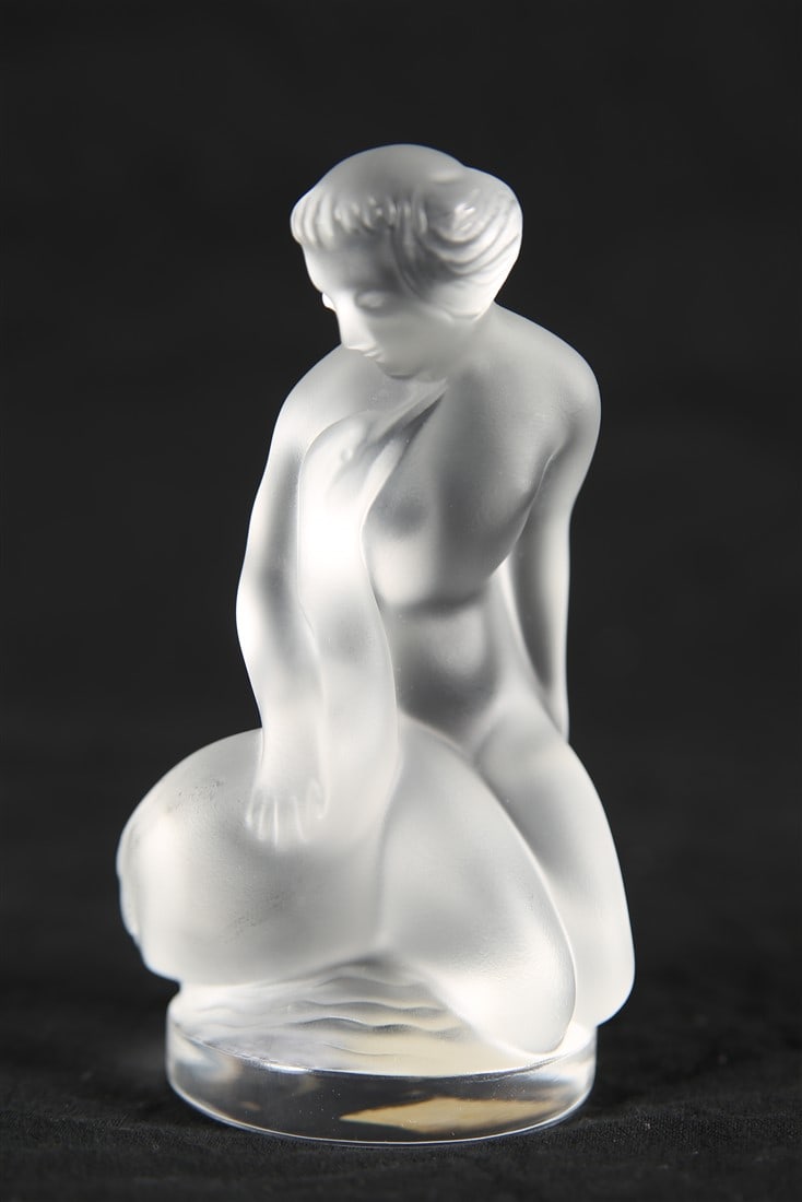Lalique, "Leda and the Swan" Crystal Figurine: Lalique (France, established 1888). "Leda and the Swan" figurine. Frosted crystal. Height: 4 1/2", Diameter: 2 1/2". Frosted crystal figurine of Leda and the Swan. Etched to the underside "Lalique (R)