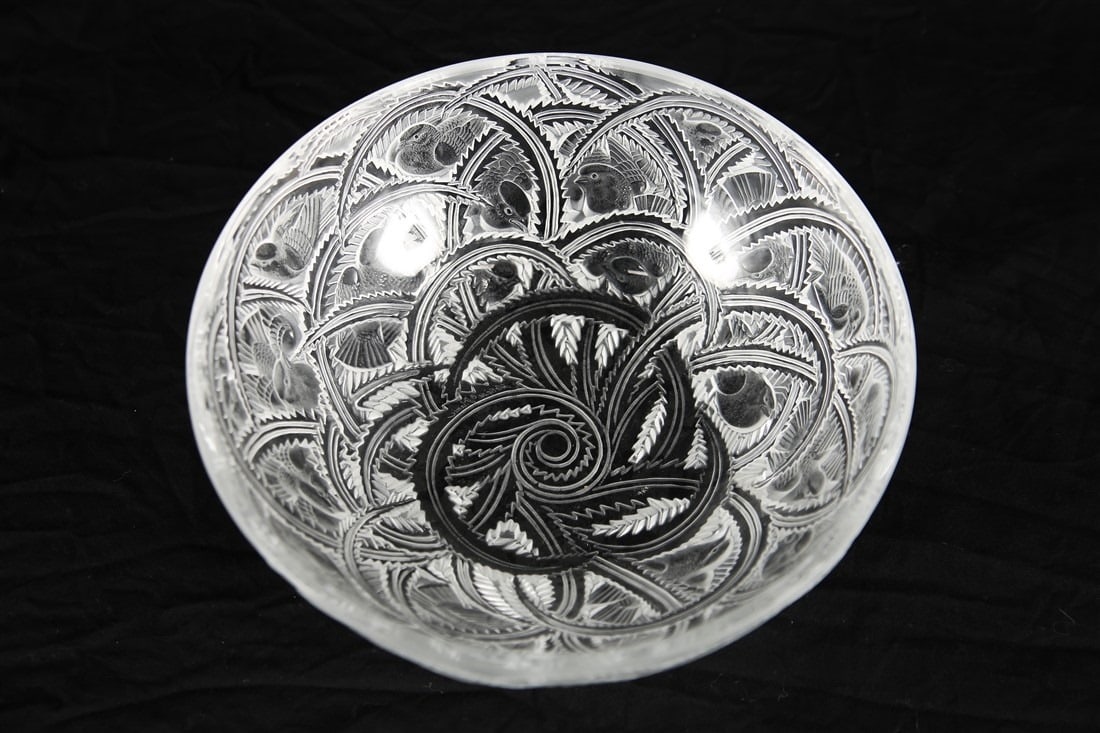 Lalique, "Pinsons" Crystal Bowl: Lalique (France, established 1888). "Pinsons" bowl. Crystal. Height: 3 3/4", Diameter: 9 1/4". Lalique "Pinsons" crystal bowl featuring swirling bush tendrils with birds within. Etched to the undersid