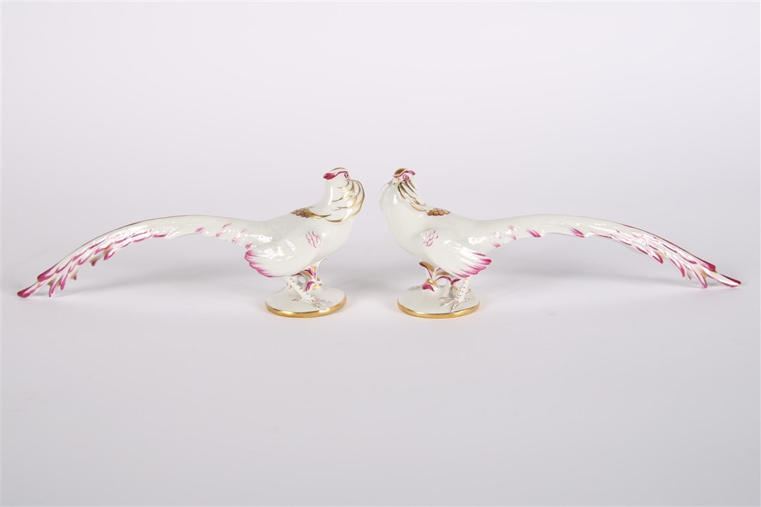 Style of Augarten, Pair of Porcelain Pheasants: Porcelain. Height: 3", Length: 8 1/4", Depth: 2 1/4". Porcelain pheasant figurines in the style of Augarten. "Made in Hungary" and 5025 stamps to underside.