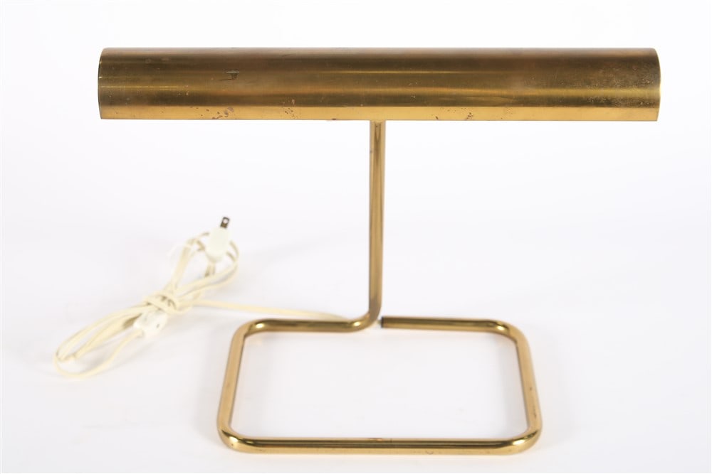Koch and Lowy, Brass Tubular Desk Lamp: Koch and Lowy. Brass. Height: 12 1/4", Length: 14 3/4", Depth: 9". Tubular form base with shade. Lamp is marked, "Koch and Lowy OMI". Functional.