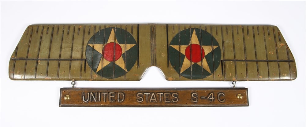 Specialties, Inc., USA S-4C Biplane Decor: Specialties, Inc. Painted wood, 1972. 14" x 48". Painted wood wall decoration depicting the top of the World War I American Thomas-Morse S-4C biplane. Plaque attached reads "United States S-4C".