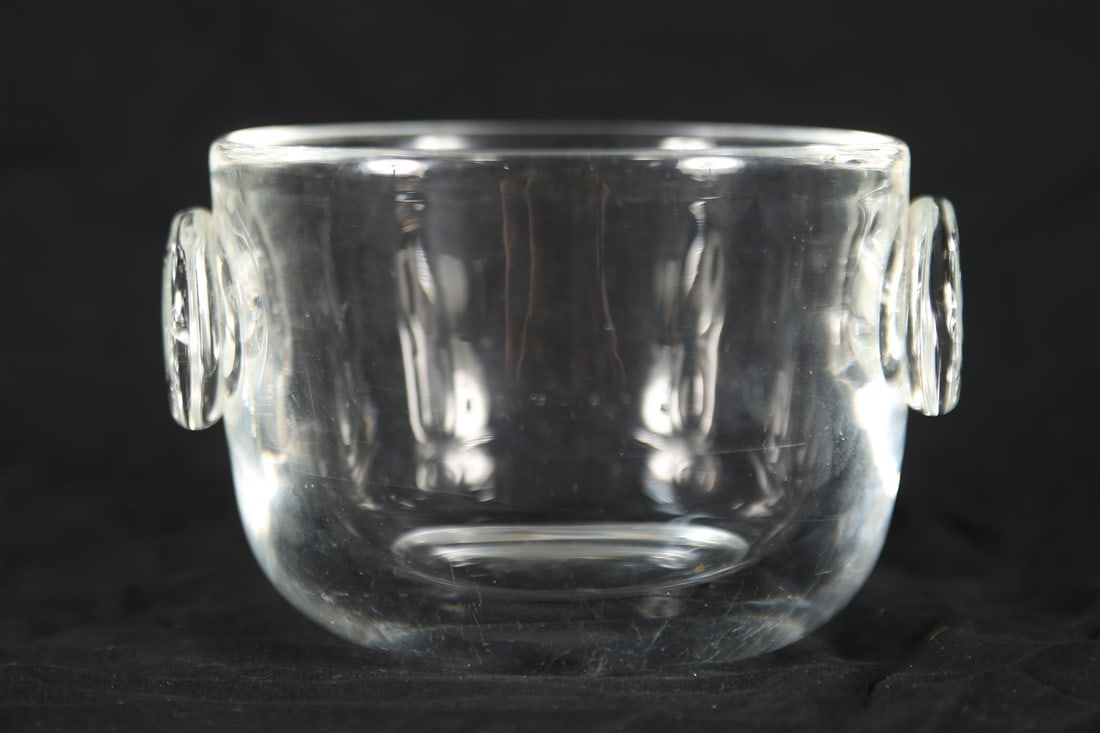 Steuben, Crystal Bowl with Handles: Steuben Glass Works (American, established 1903). Crystal. Height: 4 1/4", Diameter: 6 1/2". Crystal bowl with two circular handles designed by Steuben. Etched Steuben signature to the underside.