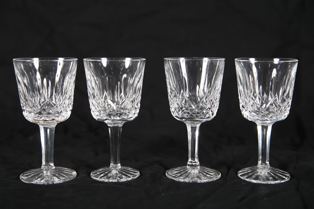 Waterford, "Lismore" Four Port Wine Glasses: Waterford (Irish, established 1783). "Lismore" pattern. Crystal. Height: 4 1/4", Diameter: 2 1/4". Set of four "Lismore" port wine glasses by Waterford. With Waterford insignia to the undersides.