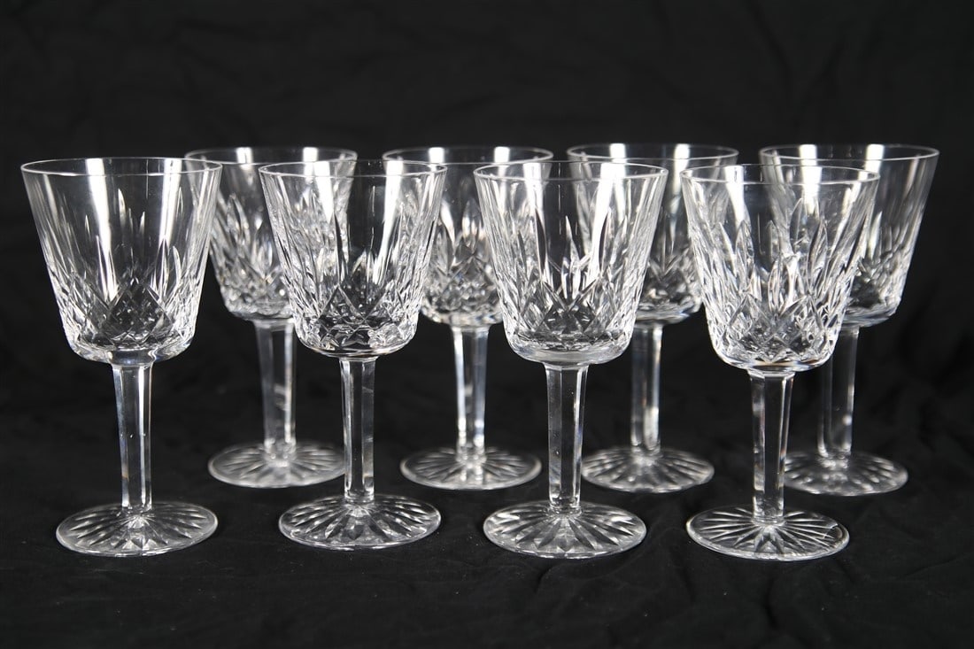 Waterford, "Lismore" Eight Claret Wine Glasses: Waterford (Irish, established 1783). "Lismore" pattern. Crystal. Height: 5 7/8", Diameter: 3". Set of eight "Lismore" claret wine glasses by Waterford. Waterford insignia to the undersides.
