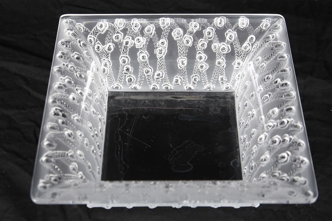 Lalique, "Roses Trellis" Square Crystal Bowl: Lalique (French, established 1888). "Roses Trellis" square bowl. Crystal. Height: 3", Length: 9 1/2", Depth: 9 1/2". Square crystal bowl by Lalique with trellis roses decorating the sides. Marked to t