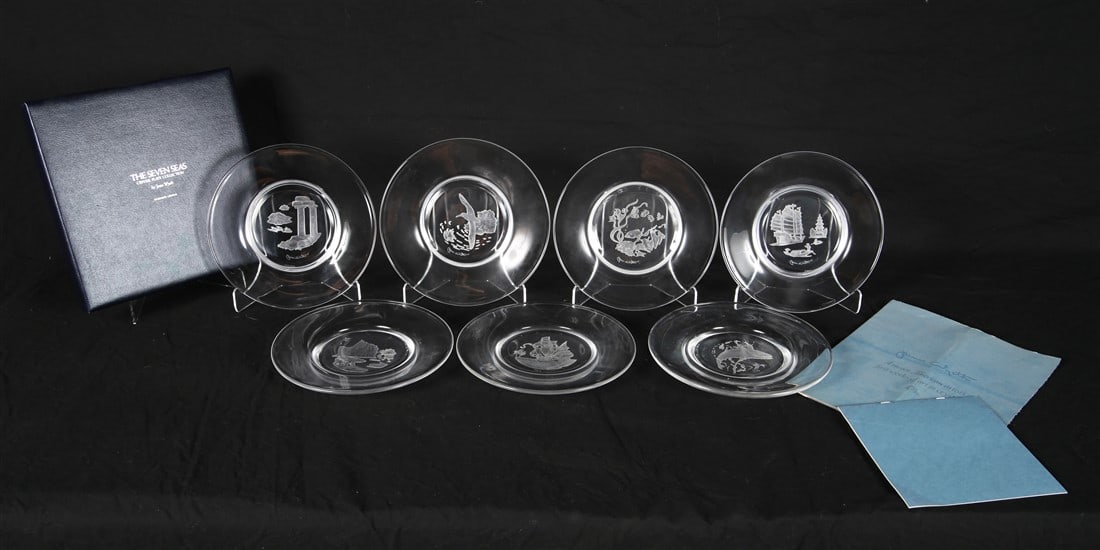 James Wyeth, "The Seven Seas" Crystal Plate Coll.: Franklin Mint after James Wyeth. "The Seven Seas". Crystal. Boxes: Height: 1 1/2", Length: 10 3/4", Depth: 10 3/4" ea. Plates: Diameter: 9" ea. Collection of seven crystal plates designed after the wo