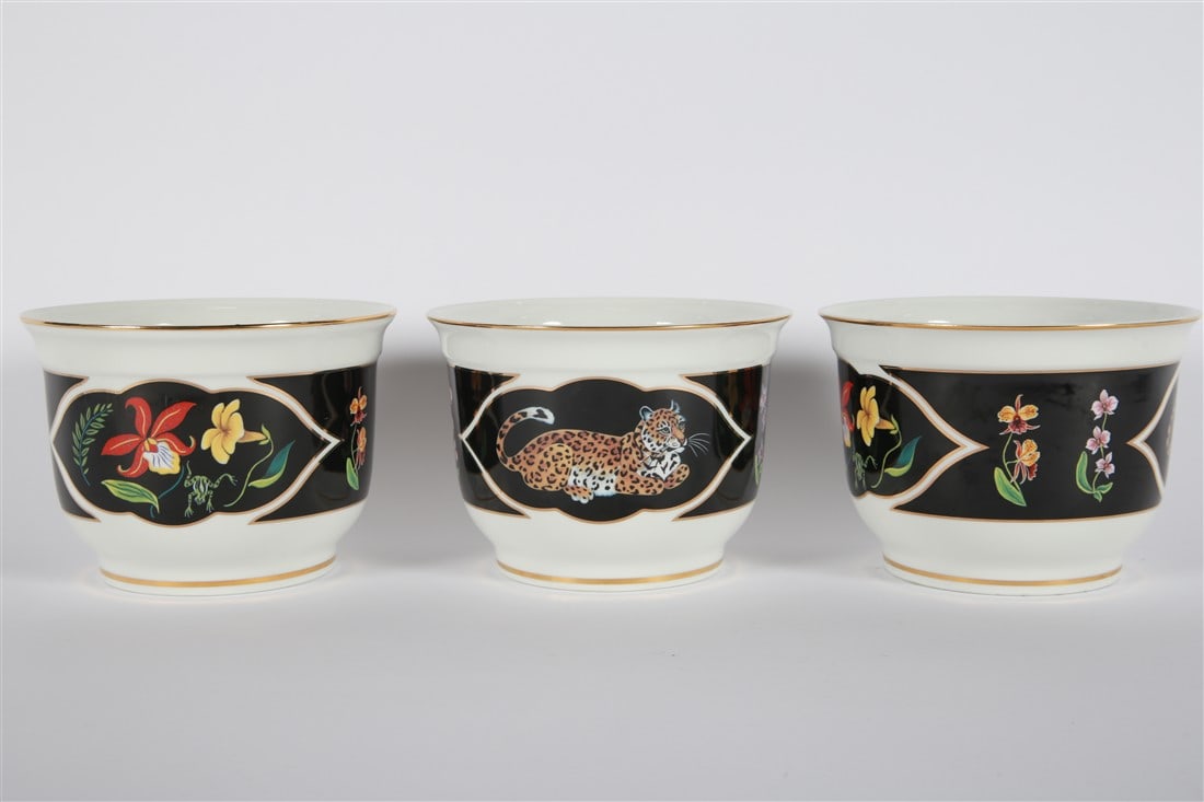 Lynn Chase, "Jaguar Jungle" Set of Three Urns: Lynn Chase Designs (20th century). "Jaguar Jungle" urns. Porcelain, 24k gold, 1998 Height: 6", Diameter: 8 1/4". Set of three porcelain "Jaguar Jungle" patterned urns by Lynn Chase. With Lynn Chase in