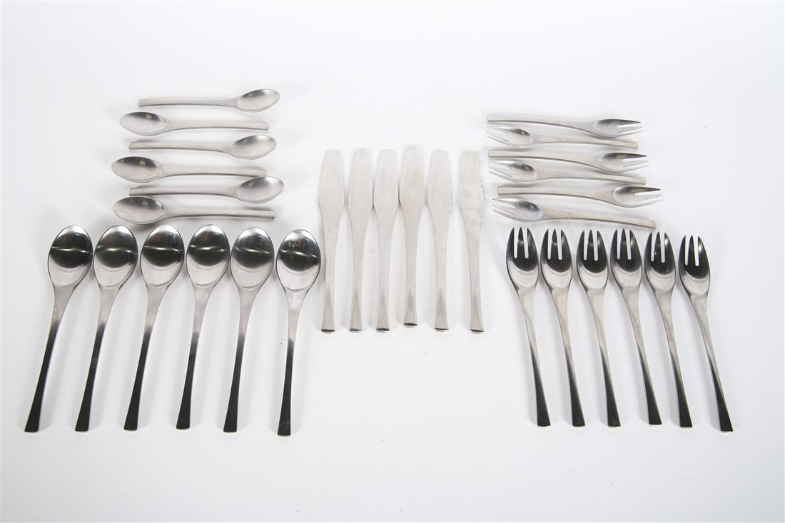 Dansk, "Odin" Stainless Flatware Set: Dansk (Danish, established 1954). "Odin" flatware. Stainless steel. Designed by Jens Quistgaard. 30 pieces. Thirty (30) pieces of stainless steel flatware by Dansk in the "Odin" pattern. Includes six