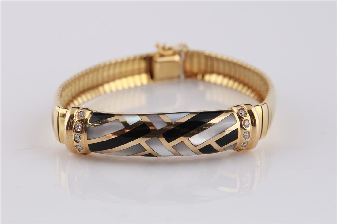Asch Grossbardt, 14k Yellow Gold Bracelet: Asch Grossbardt (American). Bracelet. 14k yellow gold, mother-of-pearl, onyx, diamonds. Length: 6 1/2". Weight: 20.3g. 14k yellow gold bracelet decorated with cut onyx and mother-of-pearl with diamond
