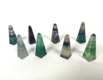 Eight Carved Fluorite Obelisks - 274g