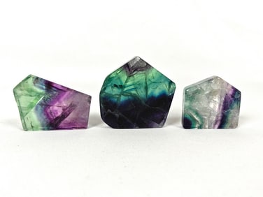 Three Polished Freeform Rainbow Fluorite Stones