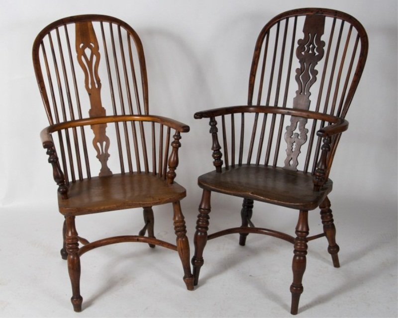 Two Yew and Elm Windsor Armchairs, 19th C.: Two yew and elm Windsor armchairs. English, 19th century. With arched spindle back centering a pierced splat, saddle seat on splayed turned legs. Provenance: Malcom Franklin, Chicago.