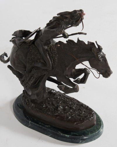 After Frederic Remington (1861-1909), "Cheyenne": After Frederic Remington (American, 1861-1909). "Cheyenne". Bronze. Signed. Height 19", width 22".