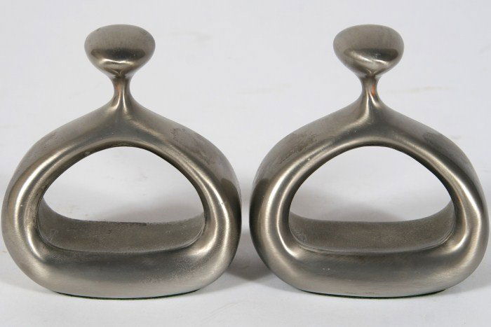 Pair Ben Seibel Pewter Bookends, American, 20th C.: Pair Ben Seibel pewter bookends. American, 20th century. Made by Jenfredware. Signed on back and with sticker on bottom. Height 5 1/2", width 5".