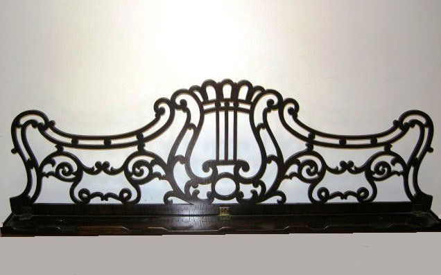 Rosewood Music Rack, 19th C.: Rosewood music rack. Mexican, 19th century. Part of a piano or melodeon. Length 37".