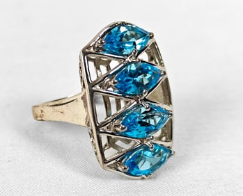 Sterling Silver Ring w/ Four Blue Stones