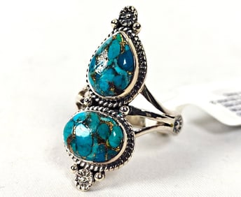 Sterling Silver Ring w/ Two Polished Teal Stones