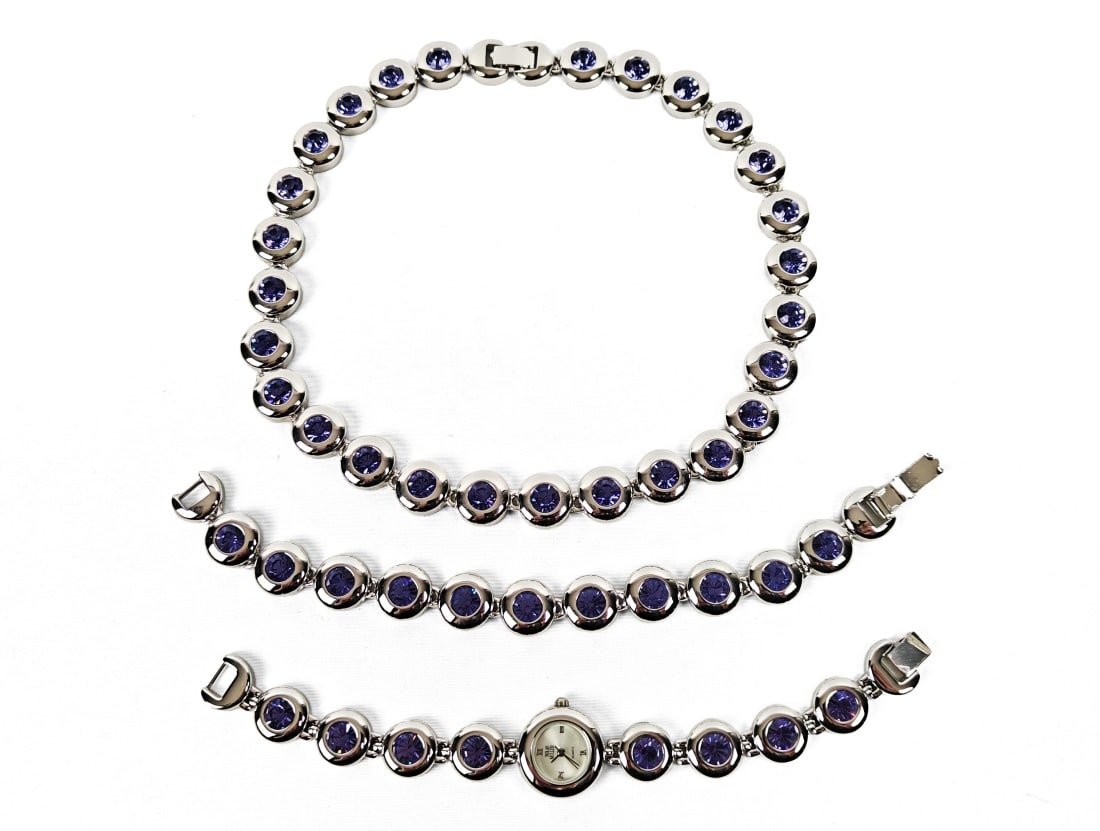 Nolan Miller, Three-Piece Fashion Jewelry Set: Nolan Miller, three-piece costume jewelry set. Set consists of silver-tone necklace with round links set with round blue stones with matching bracelet and watch.