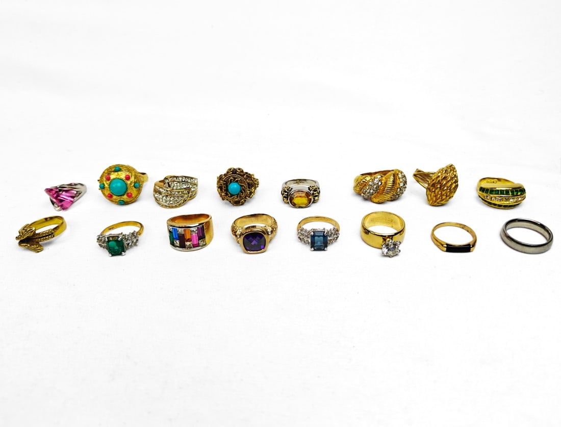 Lot of Sixteen Unbranded Fashion Rings: Various styles and sizes.