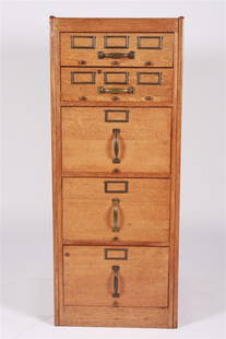 Oak Five-Drawer Filing Cabinet: Oak, metal. Height: 51 1/2", Length: 20 3/4", Depth with handles: 27 1/2". Oak five-drawer filing cabinet. Appears unlabeled. Provenance: From a private collection in Grosse Pointe Farms, Michigan.