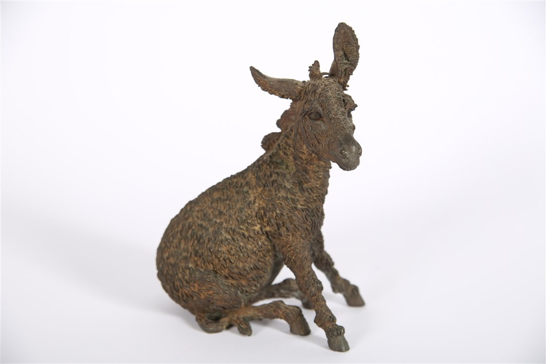 Peter Jepsen, "Brighty" Bronze Burro: Peter L. Jepsen (American, 1921-1994). "Brighty". Bronze. From an edition of 100. Height: 8 1/4", Length: 6", Depth: 4". Bronze burro by commercial artist Peter L. Jepsen designed to promote the film 