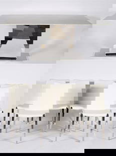 Zuri Furniture, "Bianco" Dining Table with Chairs: Zuri Furniture (American, established 2006). "Jordan" dining chairs. "Bianco" dining table. Chairs: faux leather, polished stainless steel. Table: Italian Carrara marble, polished stainless steel. Cha