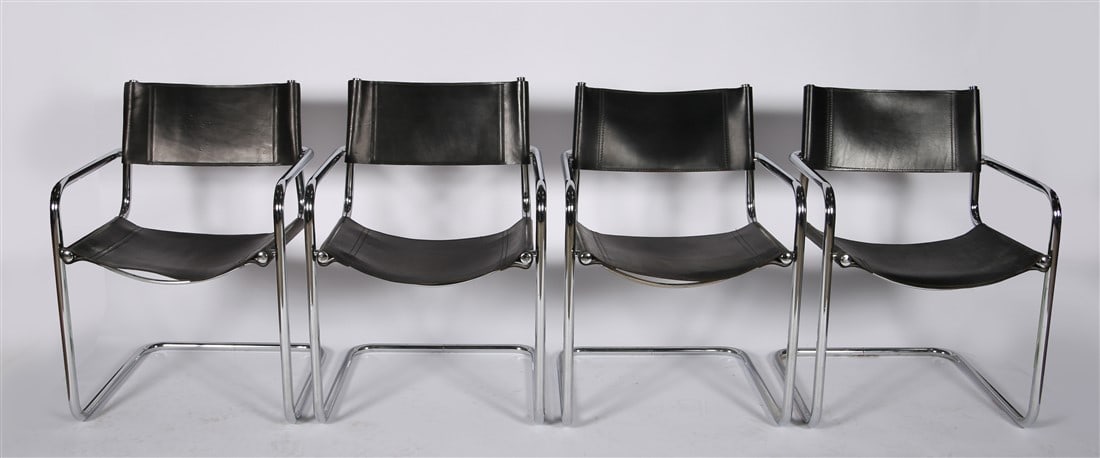 Style of Breuer, Four Chrome Cantilever Chairs: Leather, chromed metal. Height: 31 1/2", Length: 21 1/2", Depth: 21", Seat Height: 16". Set of four tubular chrome cantilever chairs with black leather strap seats and backrests. Similar in style to c