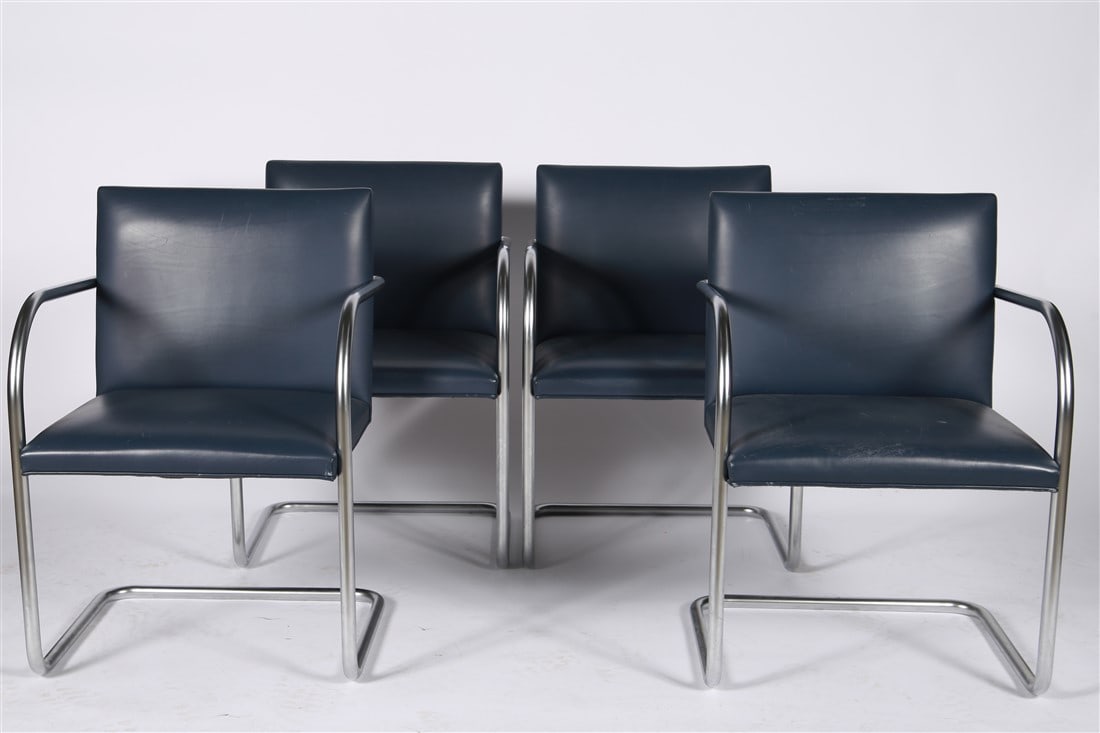Mies van der Rohe for Knoll, Four BRNO Chairs: Ludwig Mies van der Rohe (German, 1886-1969). "BRNO" chairs. Leather, chrome. Design: 1930. Height: 31 1/2", Length: 22", Depth: 23 1/2". Set of four blue leather BRNO armchairs with tubular chrome fr
