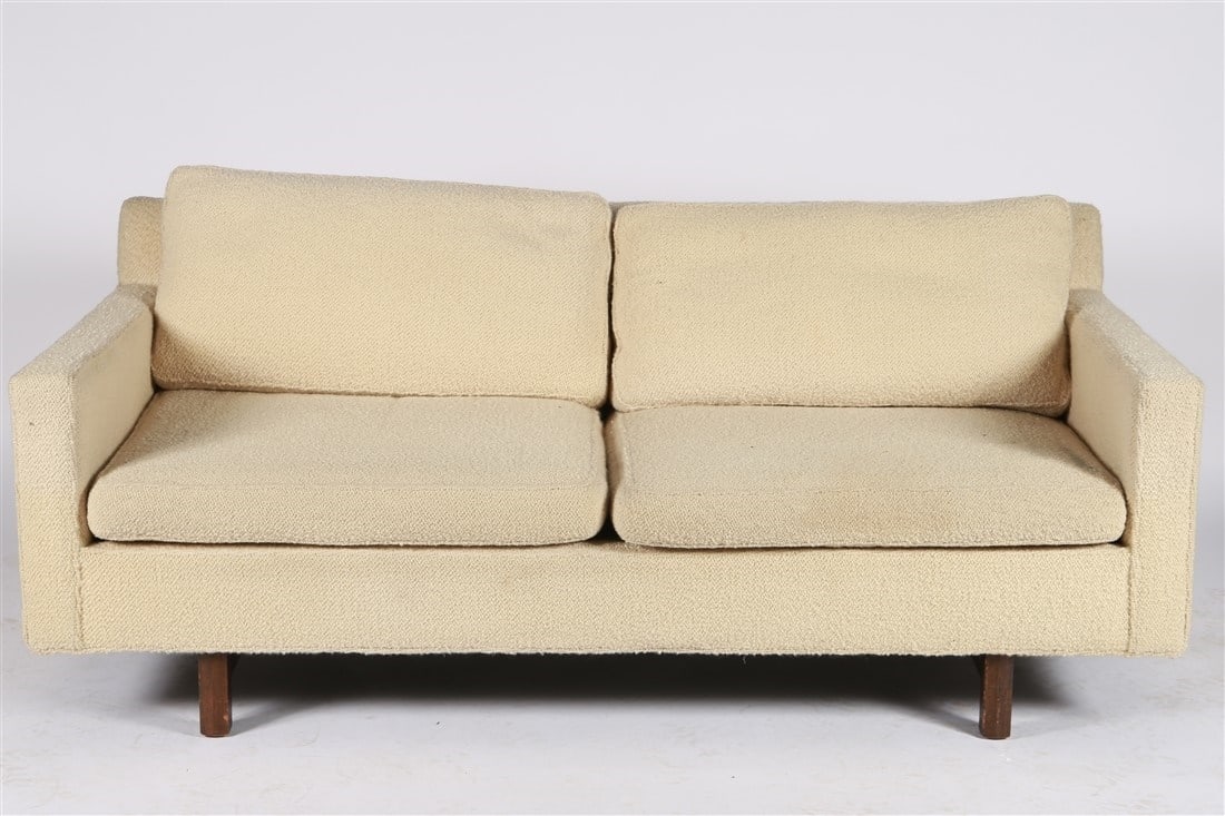 Edward Wormley for Dunbar, Loveseat: Edward Wormley. Wood, upholstery. Designed for Dunbar. Height: 28", Length: 68", Depth: 35". Cream textured upholstered sofa by Dunbar. Four cushions. Dunbar logo webbing.