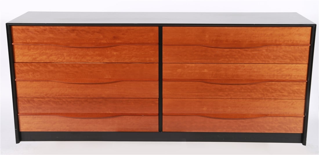 Danish Teak Veneer Dresser: Teak veneer. Height: 30 1/2", Length: 71 1/2", Depth: 19". Teak veneer dresser consisting of six drawers. Marked to the reverse with a "Made in Denmark" label. Similar in style to John Kapel for Glenn