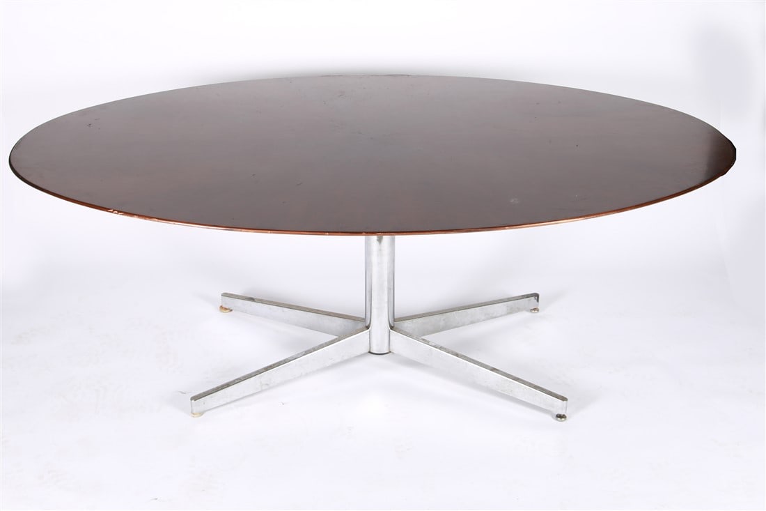 Stow Davis, Mid-Century Sunburst Dining Table: Stow Davis (American). Walnut, chromed metal. Pattern: T-048-2103. Height: 28 1/2", Length: 78", Depth: 47". Stow Davis mid-20th century sunburst style dining table. Oval table with chromed metal base