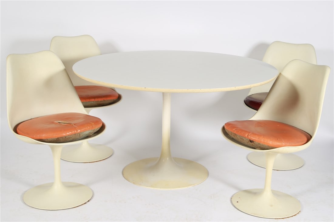 Saarinen for Knoll, Tulip Table and Chairs: Eero Saarinen (Finnish-American, 1910-1961). Manufactured by Knoll. Table: Height: 29", Diameter: 47 7/8". Chairs: Height: 32 1/2", Length: 19 1/2", Depth: 20", Seat Height: 19 1/2". White round "tuli