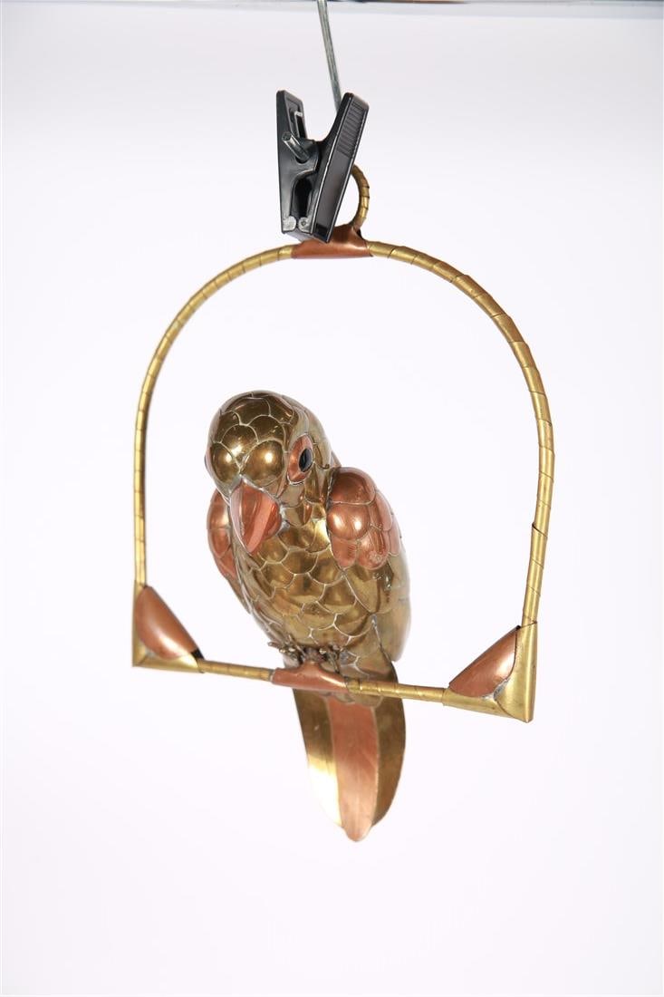 Attrib. Sergio Bustamante, Small Brass Bird: Attributed to Sergio Bustamante (Mexico, b. 1949). Brass, metal. Height (including stand): 9 1/2", Length (stand): 6 3/4", Depth: 4". Brass bird sculpture mounted on an arc stand. Bird comes off of st