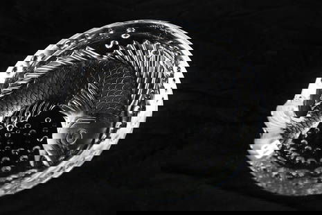 Lalique, "Concarneau" Crystal Fish Ashtray: Lalique (France, established 1888). "Concarneau" ashtray. Crystal. Height: 2", Diameter: 6 1/8". Lalique crystal "Concarneau" ashtray with a koi fish motif. Etched "Lalique (c) France" to the side of