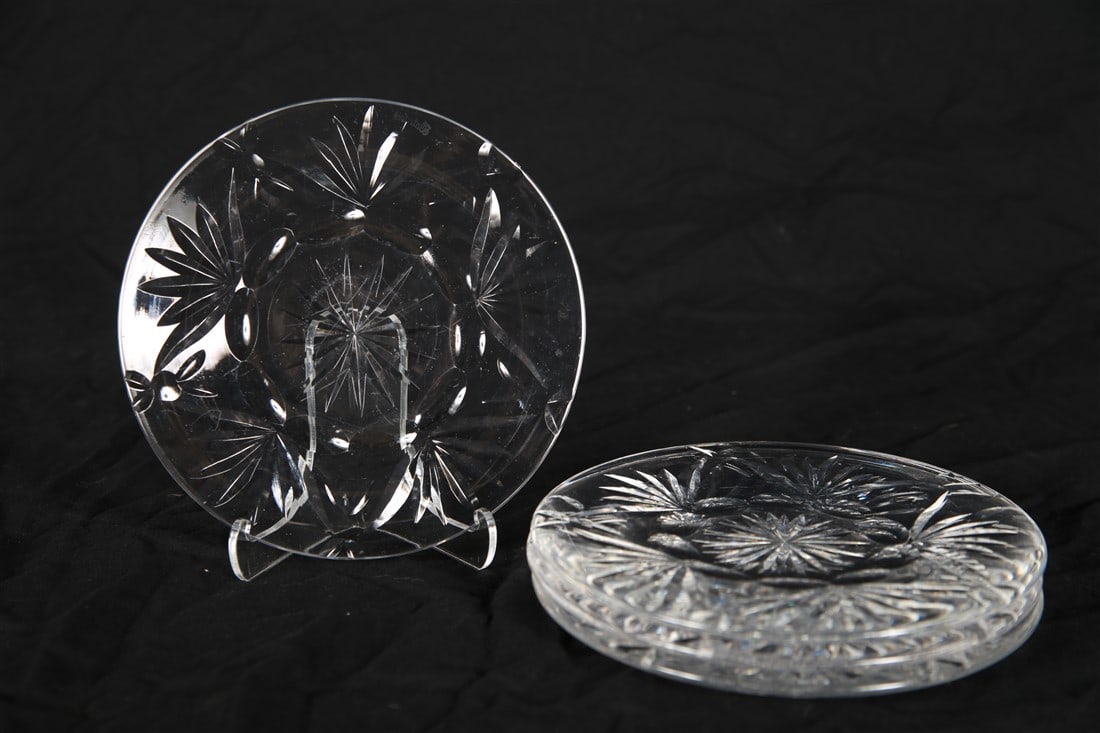 Waterford, Set of Four "Ashling" Plates: Waterford (Irish, established 1783). "Ashling". Crystal. Diameter: 6". Set of four Waterford "Ashling" crystal bread and butter plates. Marked with Waterford etched insignia to the undersides.